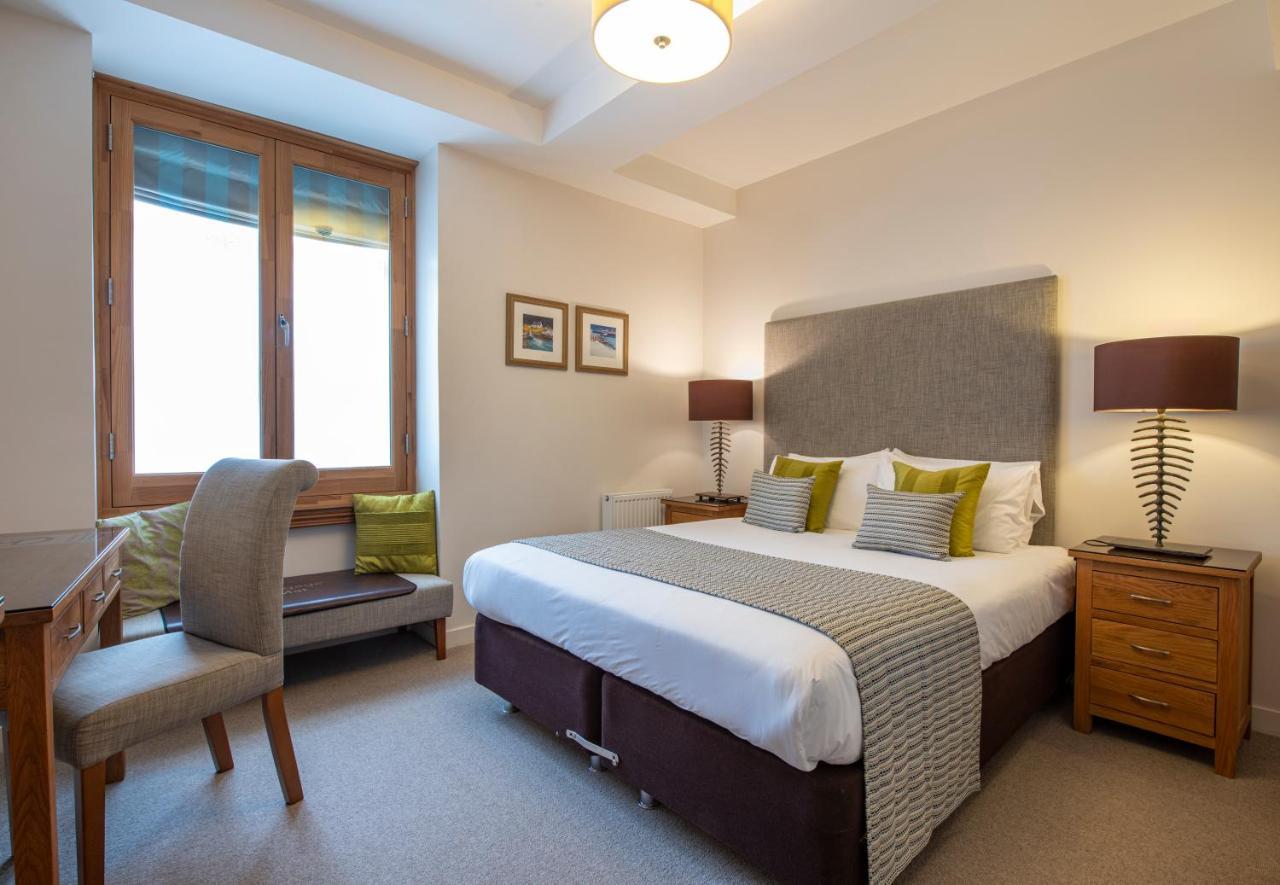 Inverness City Suites Bagian luar foto