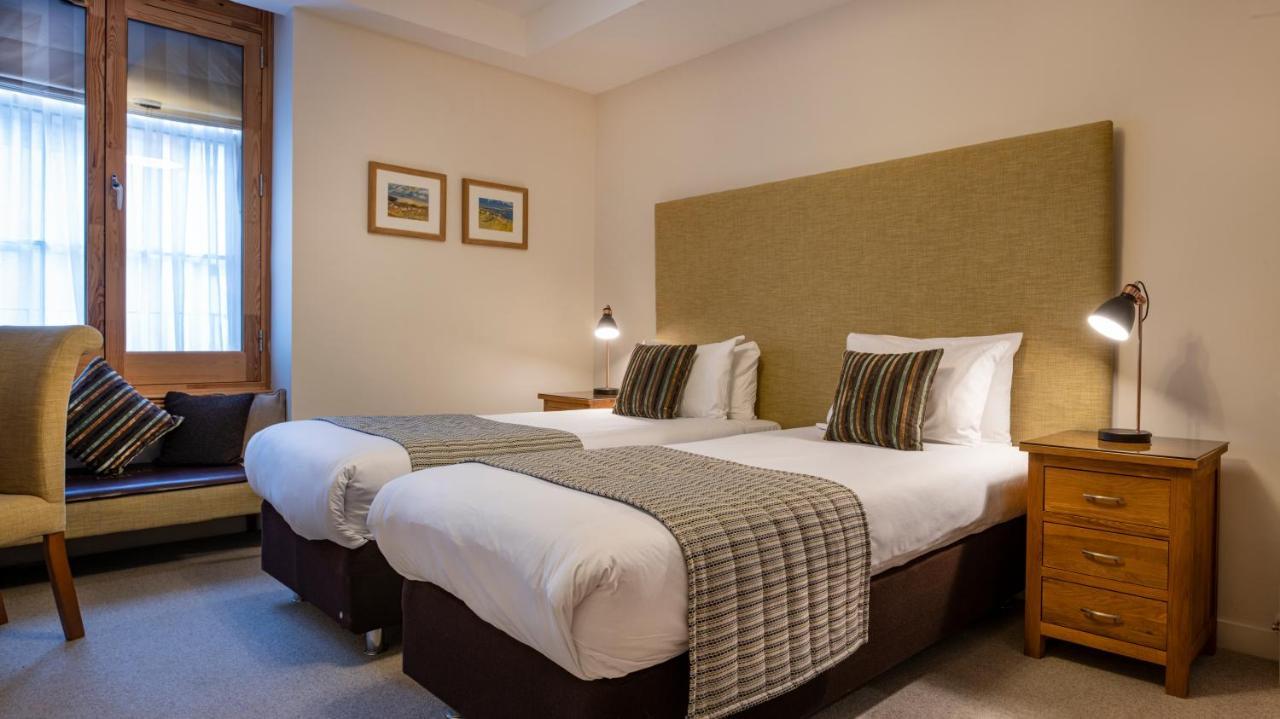 Inverness City Suites Bagian luar foto