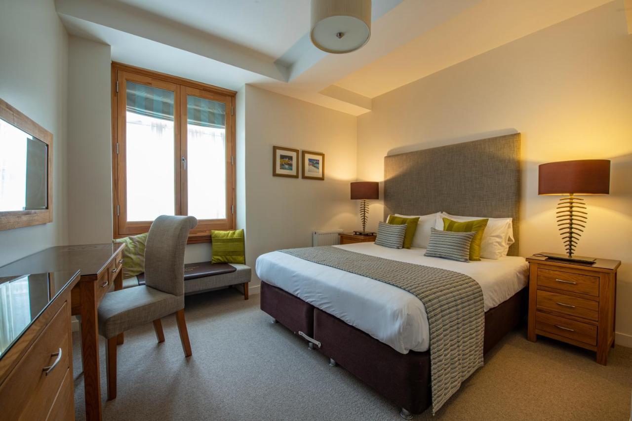 Inverness City Suites Bagian luar foto