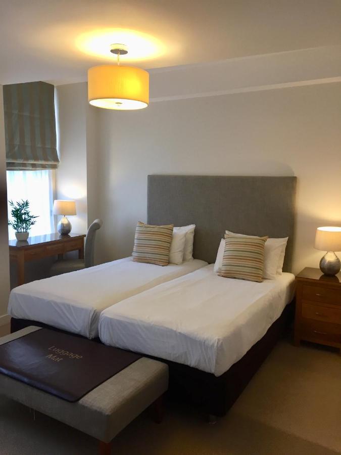 Inverness City Suites Bagian luar foto